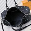 69307bed6e68136f4d9a6f62 Lot No. 13966 Embroidered Keepall Bandoulière 50 Travel Bag in Deep LV Blason Denim by Pharrell Williams