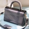 69307c1e6e68136f4d9a6fb0 Top Quality Original! Welcome to Compare! Model No.: 50392/22229/22236. This LV Twist Medium Bag is crafted from Epi grained leather, featuring woven leather wrapping around the LV Twist lock and top handle, adding a touch of elegance to its bold silhouette. The detachable and adjustable shoulder strap allows versatile carrying options—short shoulder, long shoulder, or cross-body wear.