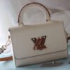 69307c206e68136f4d9a6fb4 Top Quality Original Design! Welcome to Compare Prices! Model No.: 50392/22229/22236. This LV Twist Medium Bag is crafted from Epi grained leather, featuring woven leather wrapping around the LV Twist lock and top handle, adding a touch of elegance to its striking silhouette. The detachable and adjustable shoulder strap allows for versatile carrying options—short shoulder, long shoulder, or cross-body wear.