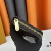 69307cb86e68136f4d9a70f3 LV Zippy Wallet in Patent Leather with Embossed Calfskin
