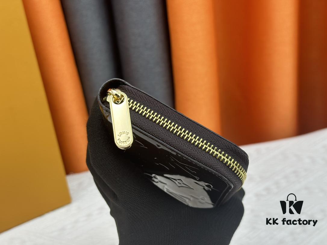 69307cb86e68136f4d9a70f3 LV Zippy Wallet in Patent Leather with Embossed Calfskin