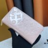 69307cb96e68136f4d9a70f5 LV Zippy Wallet in Embossed Calfskin with Smooth Leather Trim