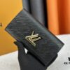 69307cd06e68136f4d9a7126 Twist Wallet M61179 Crafted from Epi Leather