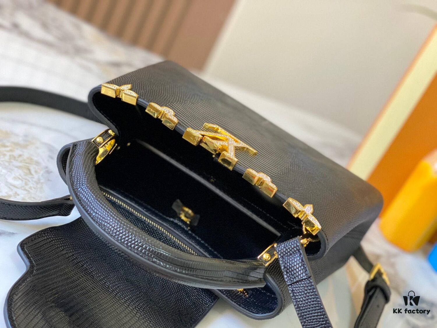 69307d4c6e68136f4d9a71e9 Top Grade Original Guangzhou Stock M12297 Black Lizard Skin with Diamond-Inlaid Golden Crown Capucines BB Handbag