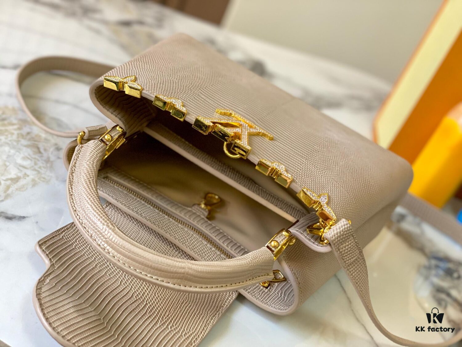 69307d586e68136f4d9a71f9 Top-Grade Original Guangzhou Stock M12297 Beige Lizard Leather with Gold Diamond Crown Capucines BB Bag