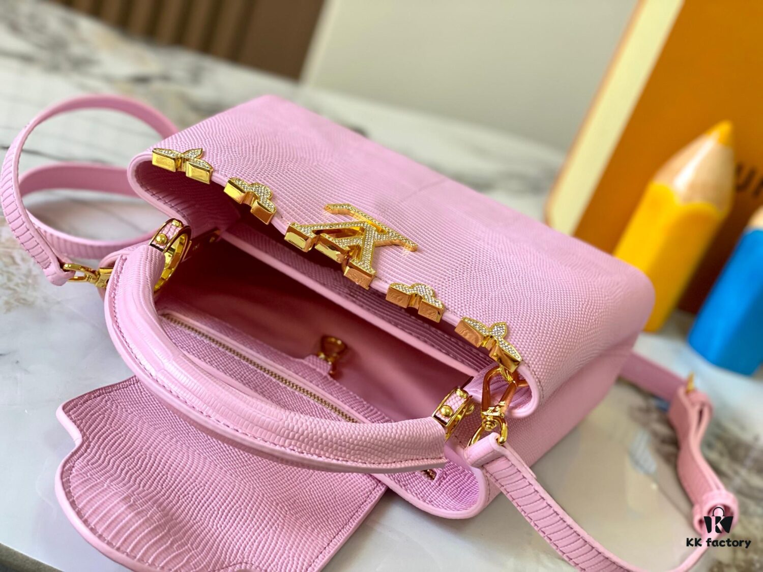 69307d7e6e68136f4d9a7230 Top-Quality Original Guangzhou Stock M12297 Pink Lizard Skin with Gold-Tone Crown Triangle Capucines BB Bag