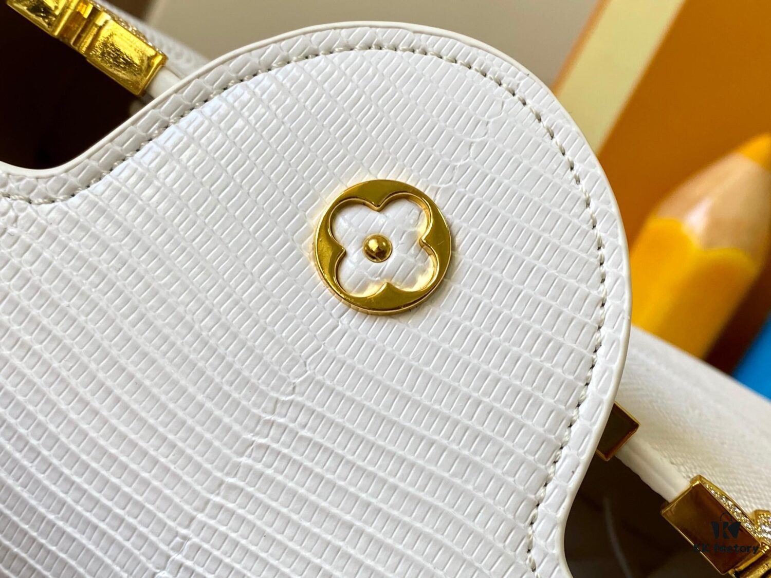69307d8a6e68136f4d9a723d Top Quality Guangzhou Original M12297 White Lizard Skin with Gold Diamond Crown Triangle Capucines BB Bag