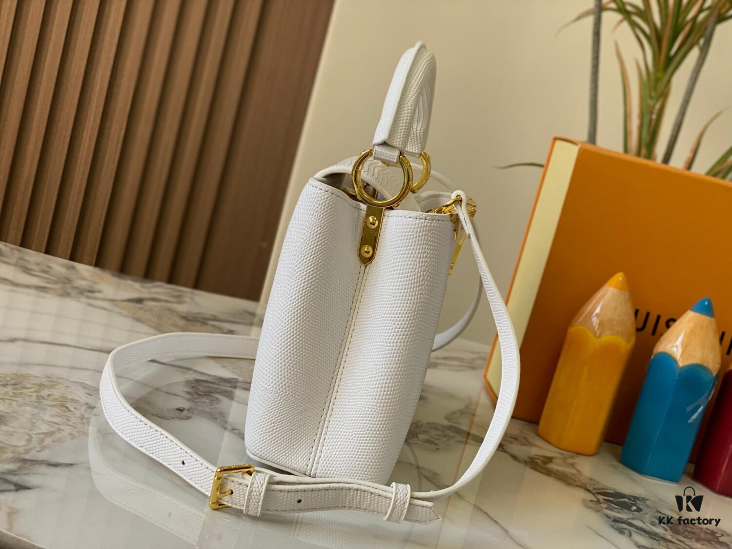 69307d8b6e68136f4d9a7242 Top Quality Guangzhou Original M12297 White Lizard Skin with Gold Diamond Crown Triangle Capucines BB Bag