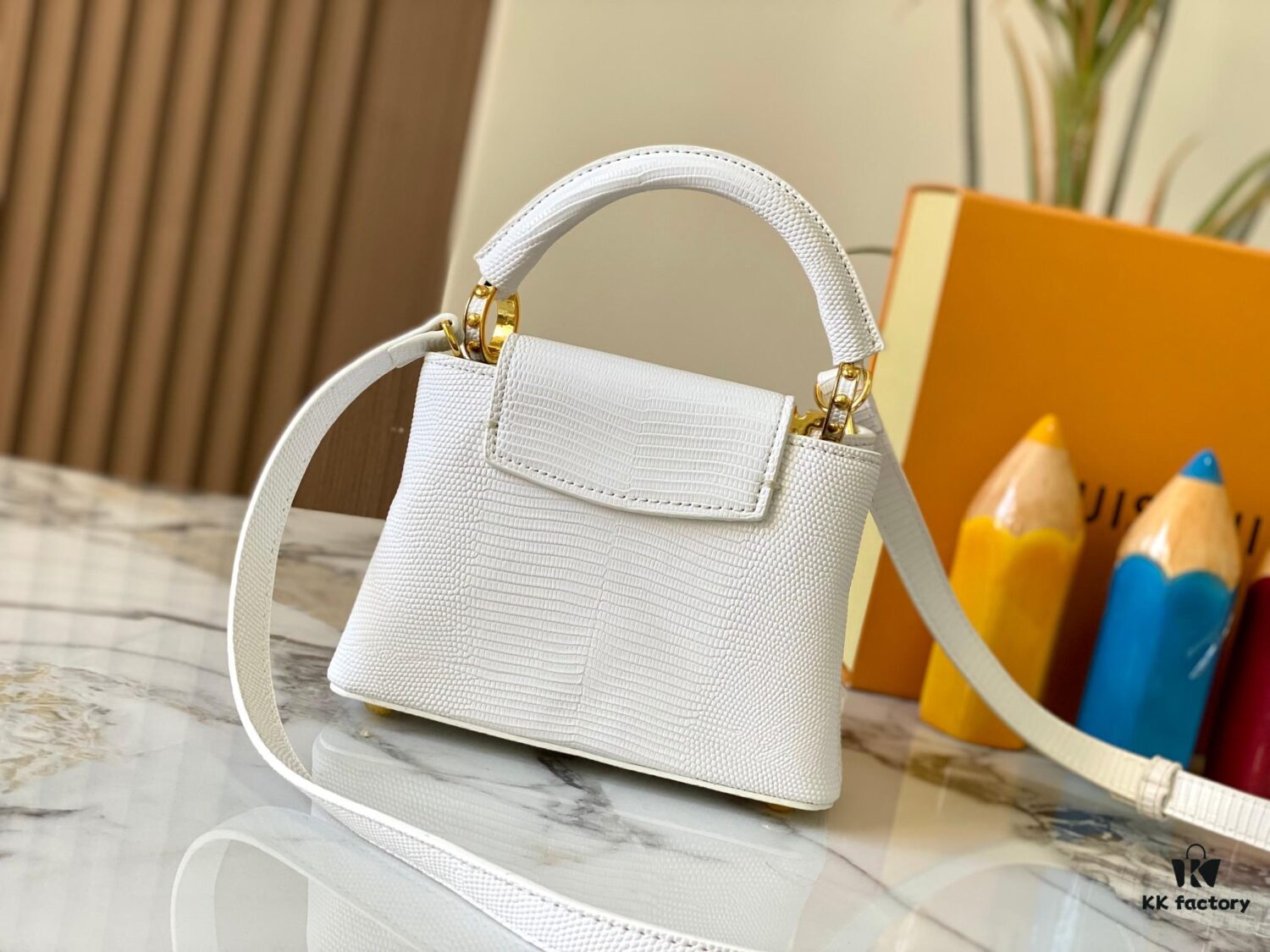 69307d8c6e68136f4d9a7244 Top Quality Original Guangzhou M12296 White Lizard Skin with Gold Diamond Crown Capucines Mini Bag