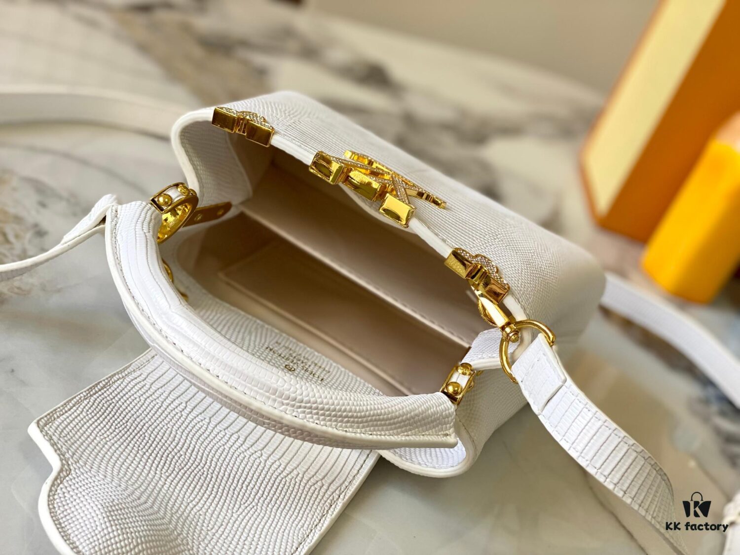 69307d906e68136f4d9a724a Top Quality Original Guangzhou M12296 White Lizard Skin with Gold Diamond Crown Capucines Mini Bag