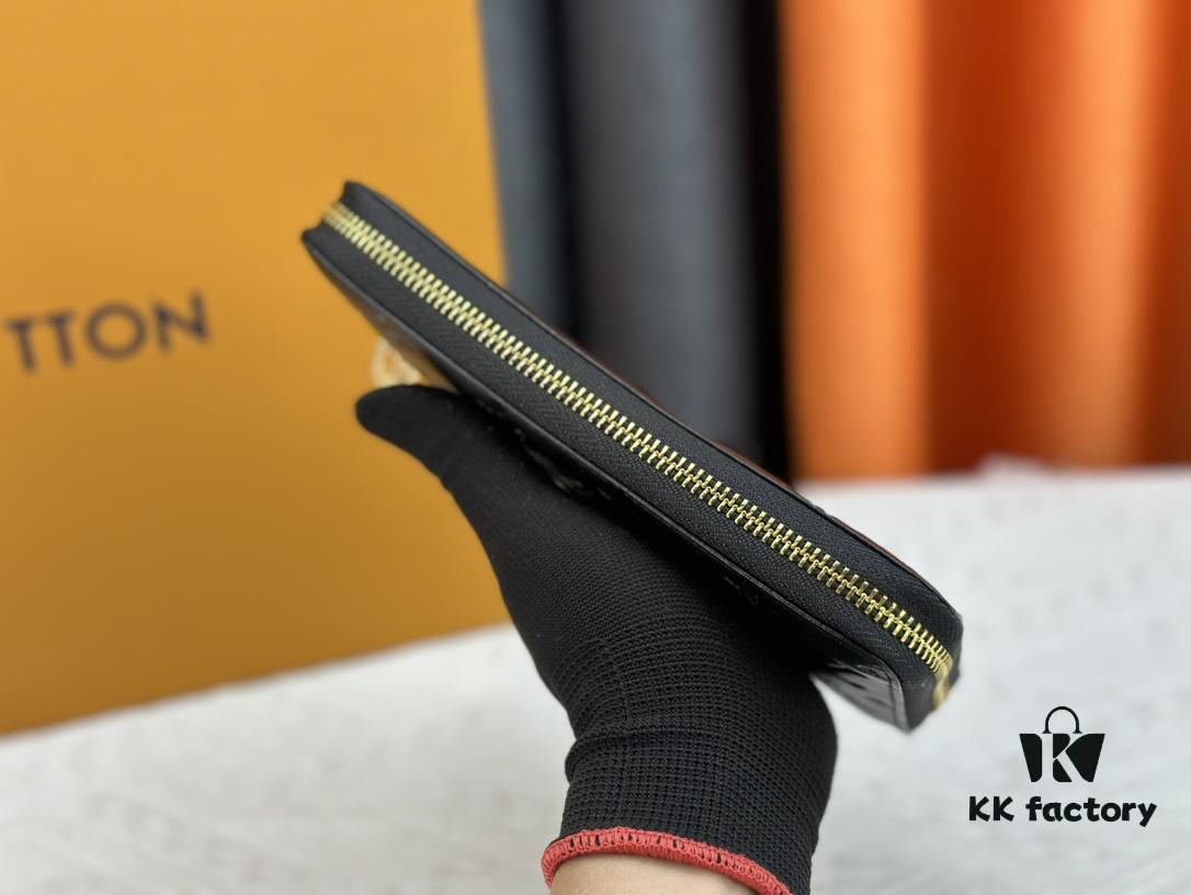 69307d9d6e68136f4d9a7269 Wallet M81510 crafted in lambskin with padded Monogram embossed pattern, complementing the Coussin leather goods collection. The elegant design features a gold-tone zipper with an LV Circle pull tab. This multi-functional wallet includes practical interior features: three large compartments, a coin pocket, and twelve card slots.