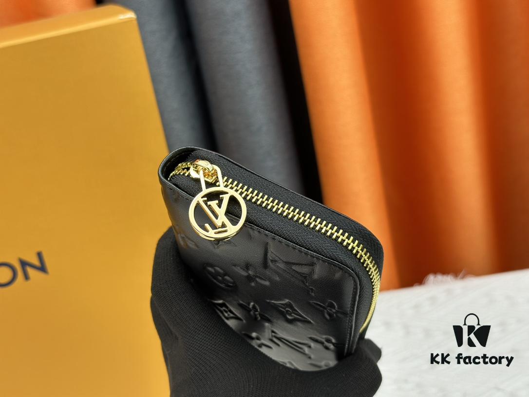 69307d9d6e68136f4d9a726c Wallet M81510 crafted in lambskin with padded Monogram embossed pattern, complementing the Coussin leather goods collection. The elegant design features a gold-tone zipper with an LV Circle pull tab. This multi-functional wallet includes practical interior features: three large compartments, a coin pocket, and twelve card slots.