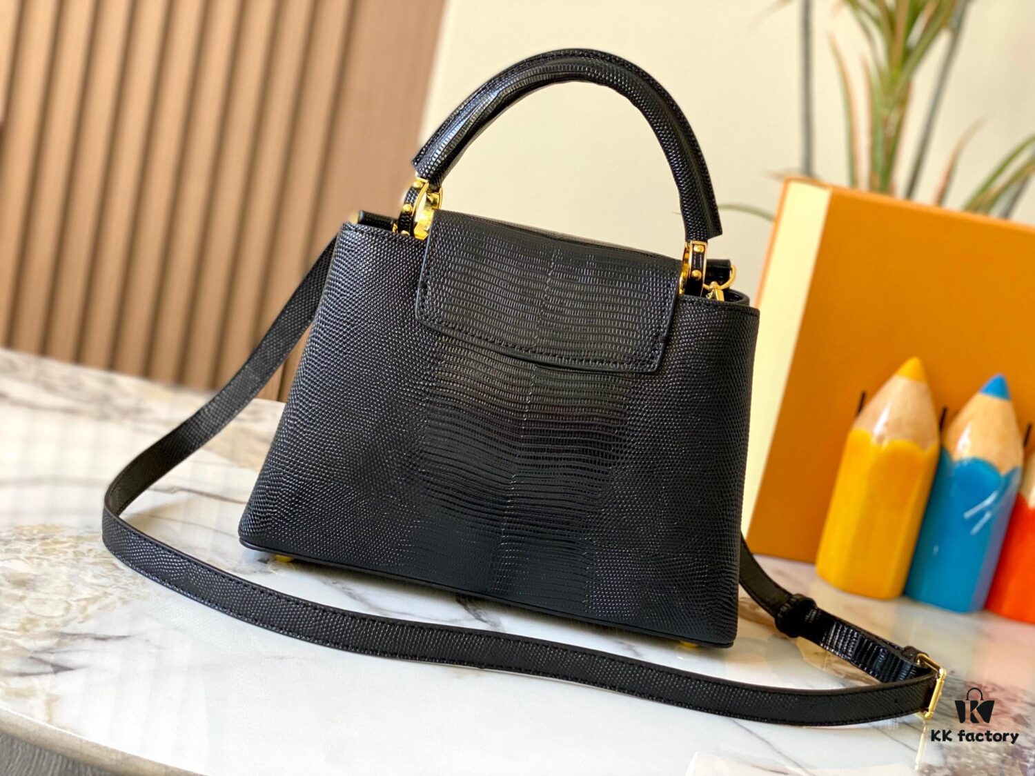 69307dfb6e68136f4d9a7320 Top Quality Original Guangzhou M99528 Black Lizard Leather Gold Buckle Capucines BB Handbag