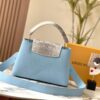 69307e866e68136f4d9a7414 Upgraded M21150 Ice Blue Capucines Medium Handbag