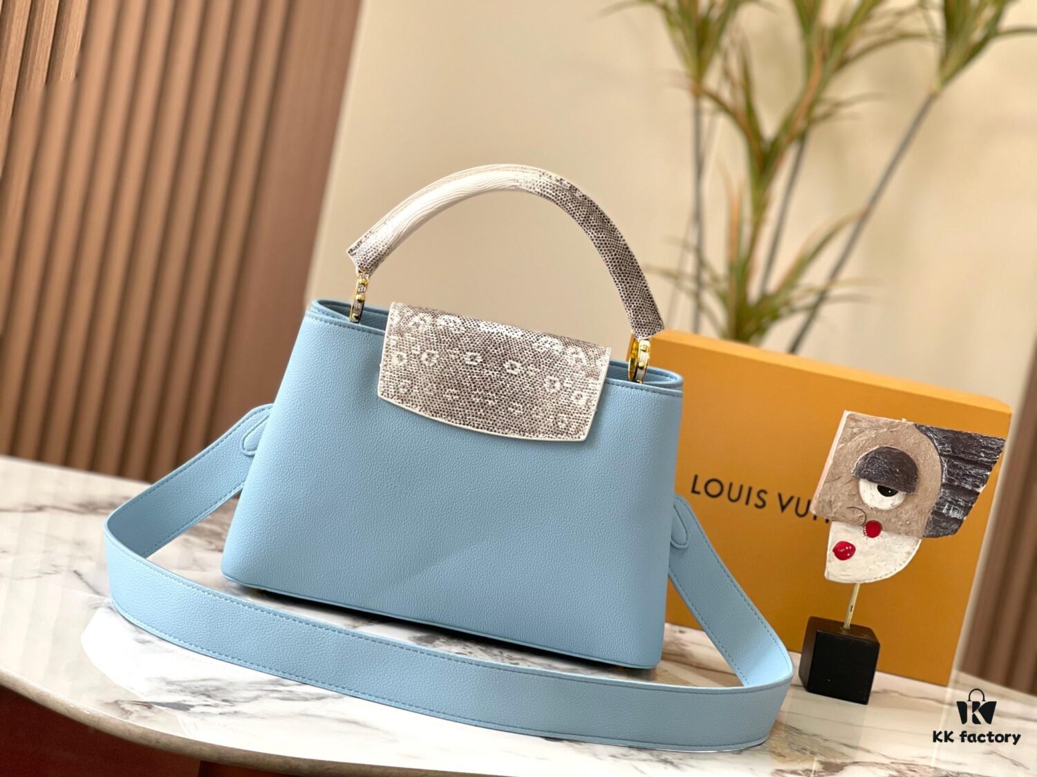 69307e866e68136f4d9a7414 Upgraded M21150 Ice Blue Capucines Medium Handbag