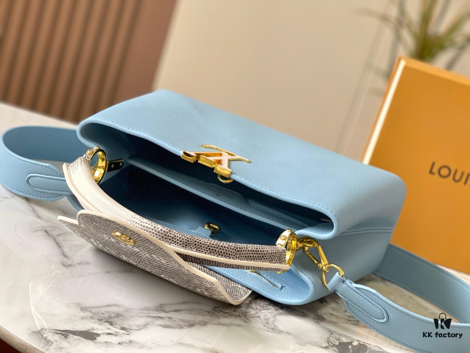 69307e8b6e68136f4d9a7419 Upgraded M21150 Ice Blue Capucines Medium Handbag