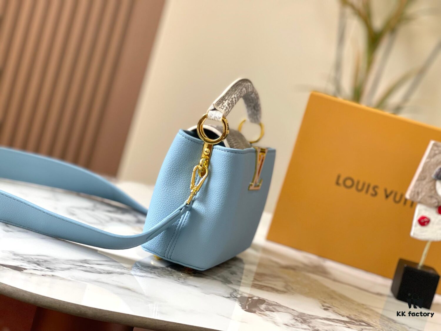 69307ea46e68136f4d9a7440 Upgraded Version M21168 Ice Blue Capucines Mini Bag