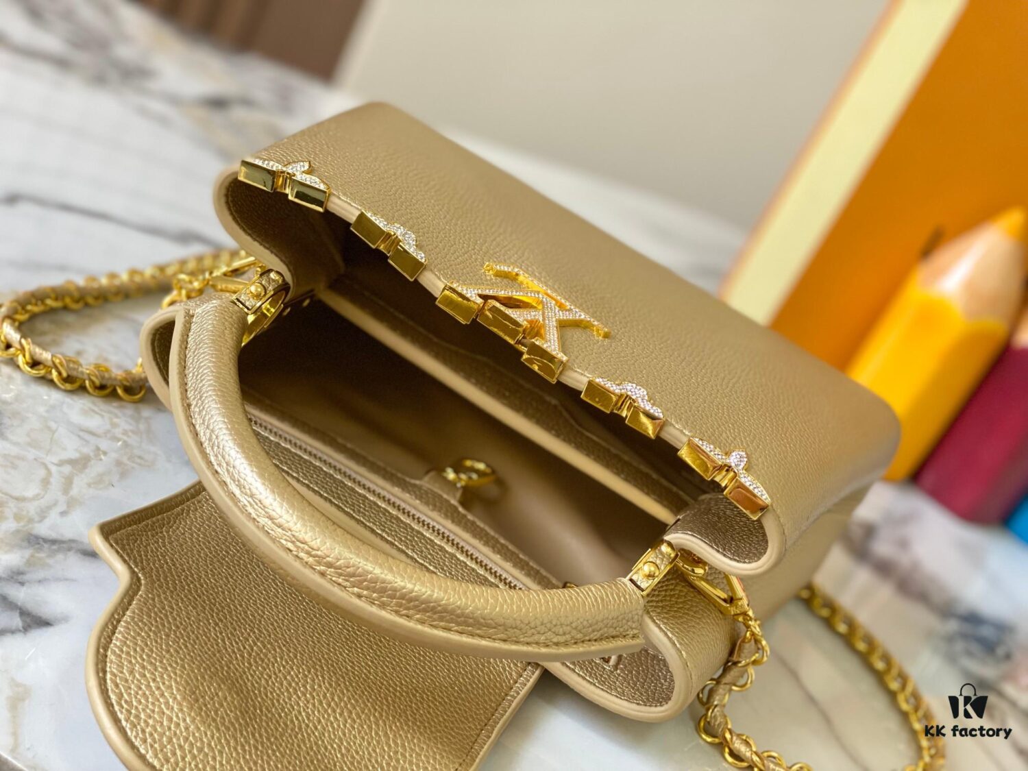 69307f026e68136f4d9a74d5 Top Quality Original Guangzhou M24584 Gold-Tone Flower Crown Bag with Crystal Diamonds