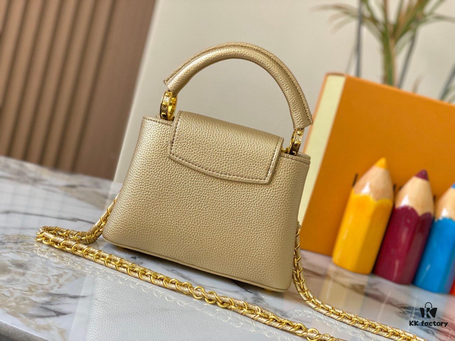 69307f076e68136f4d9a74de Top Quality Original Guangzhou M24583 Gold-Tone Flower Crown Capucines Bag
