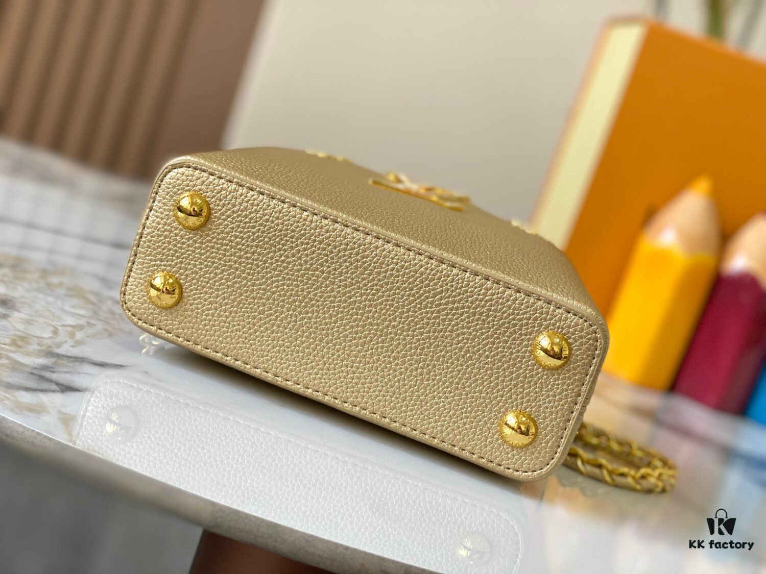 69307f076e68136f4d9a74df Top Quality Original Guangzhou M24583 Gold-Tone Flower Crown Capucines Bag