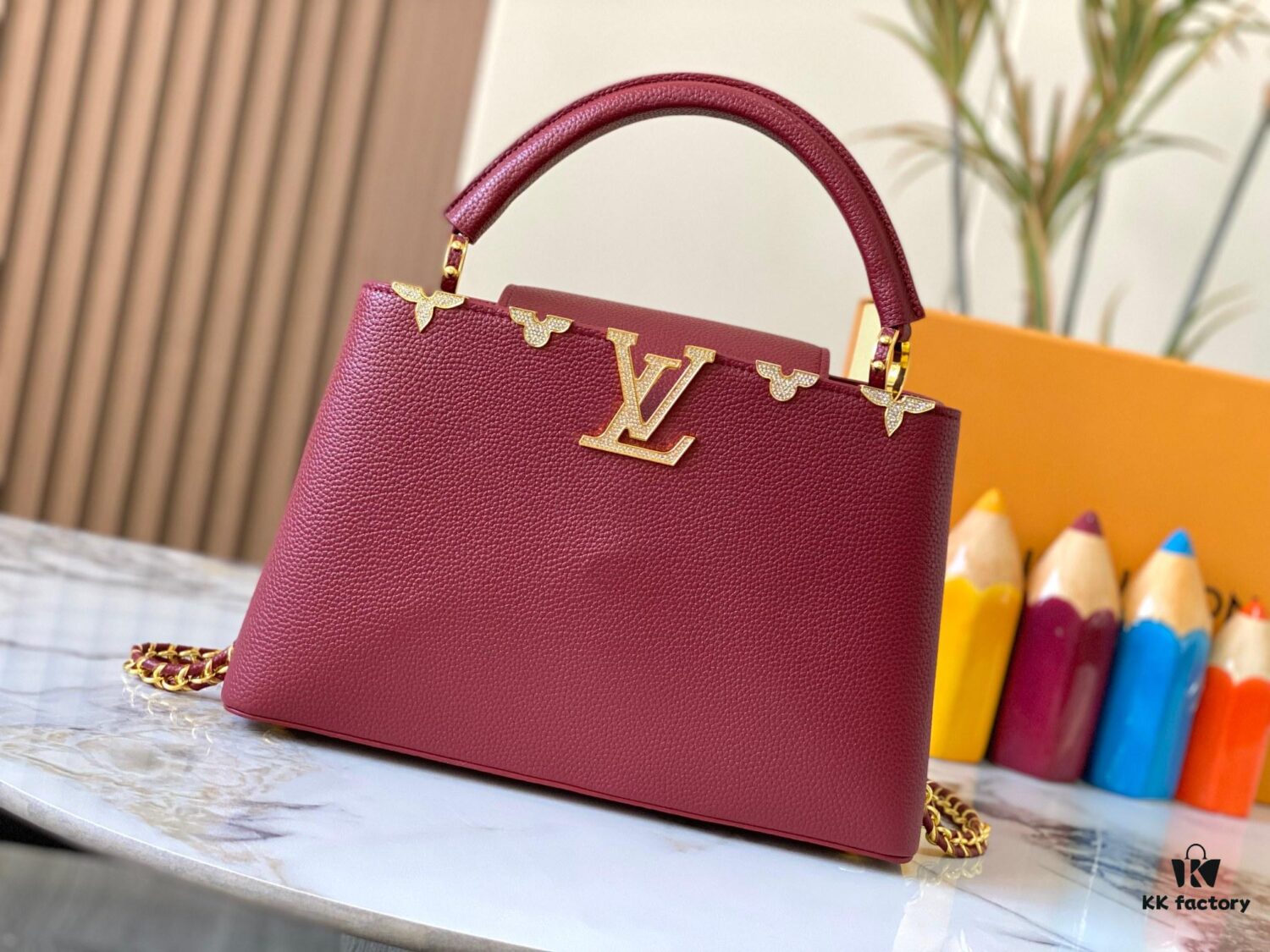 69307f096e68136f4d9a74e4 Top Quality Original Guangzhou Version M24585 Chestnut Red and Gold Diamond Flower Crown Capucines Handbag