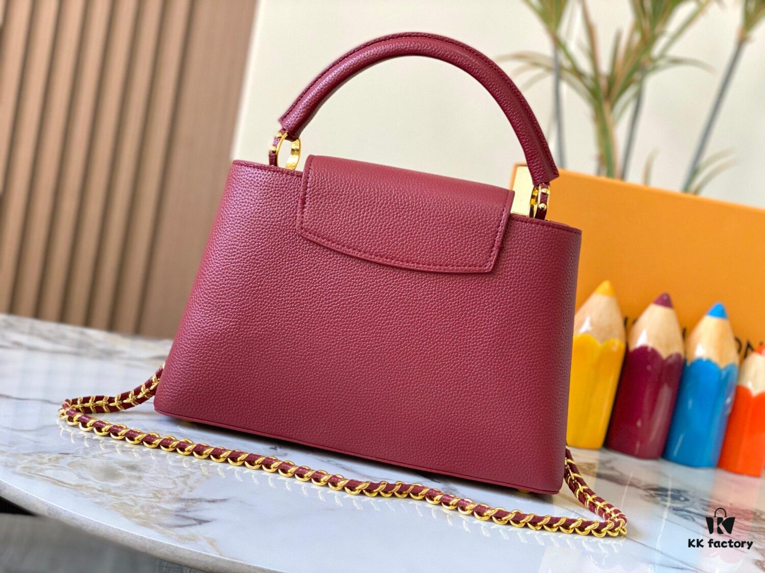 69307f0b6e68136f4d9a74e6 Top Quality Original Guangzhou Version M24585 Chestnut Red and Gold Diamond Flower Crown Capucines Handbag