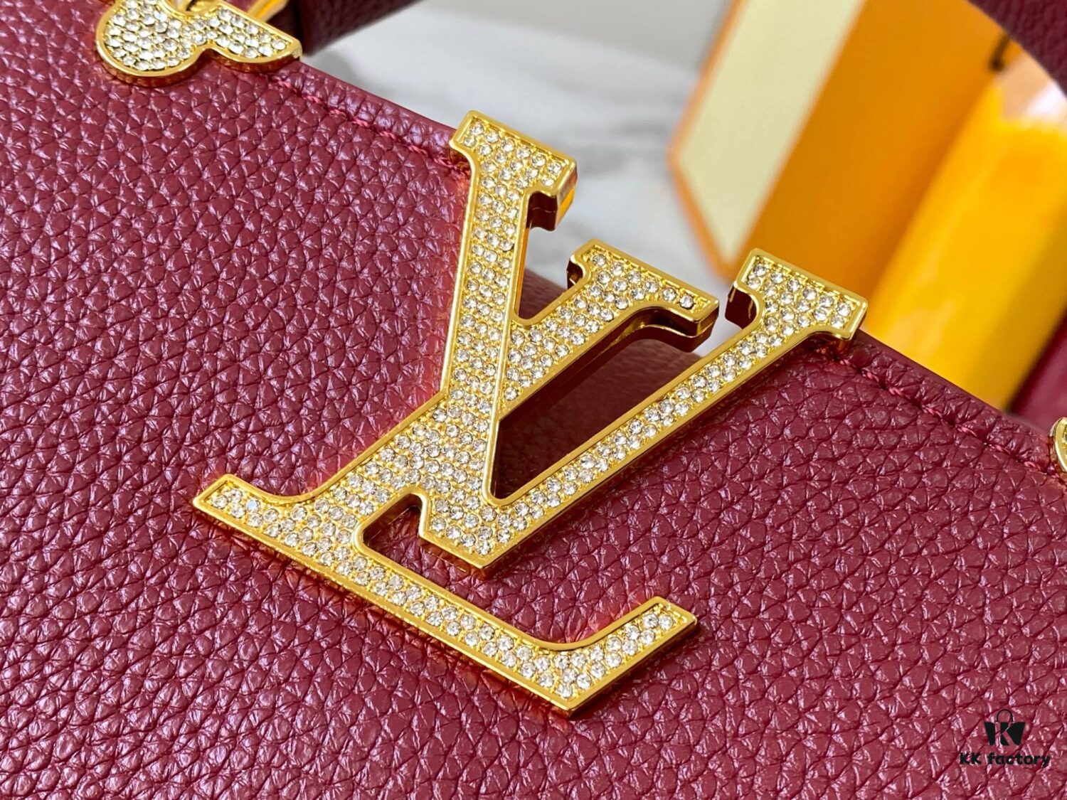 69307f196e68136f4d9a74fb Top Quality Original Guangzhou M24583 Date Red and Gold Diamond Flower Crown Capucines Handbag