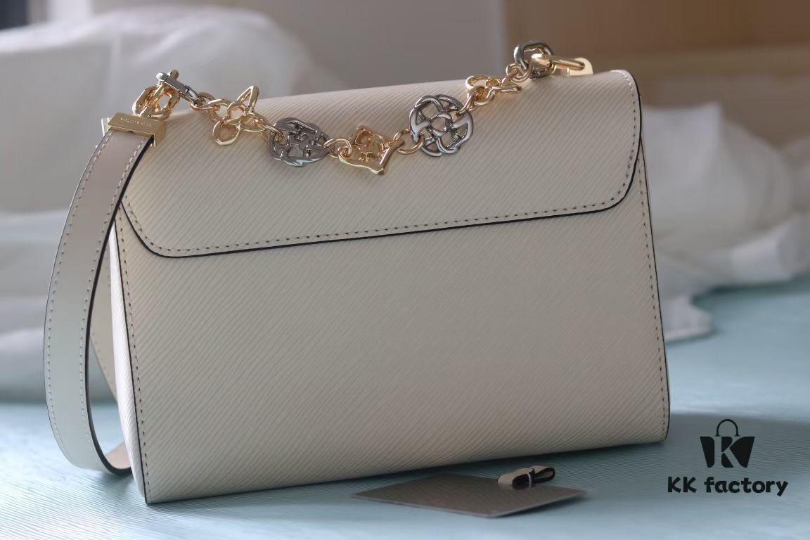 69307f9a6e68136f4d9a762d Top-Quality Original Twist Medium Handbag