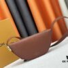 693080926e68136f4d9a7894 Low Key Bumbag in Soft Smooth Calfskin with LV Engraved Padlock and Suede Lining