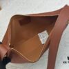 693080966e68136f4d9a789d Low Key Bumbag in Soft Smooth Calfskin with LV Engraved Padlock and Suede Lining