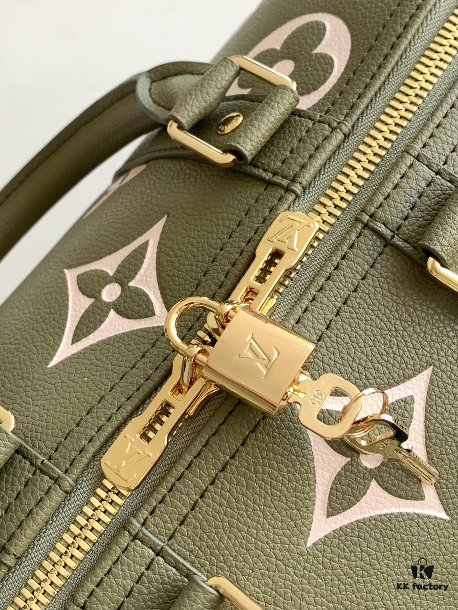 693080b06e68136f4d9a78d1 M46670 Black M46671 Green Keepall Bandoulière 45 in Monogram Empreinte Embossed Leather