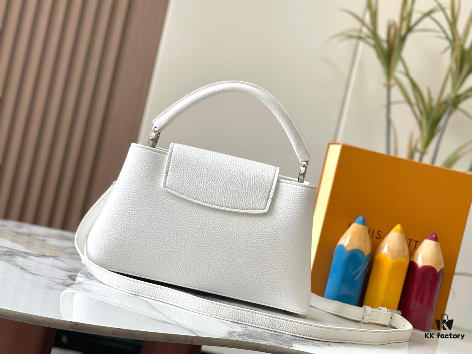 693082a36e68136f4d9a7cbd Upgraded M24664 Capucines East West Medium Handbag from the LV Crush Collection