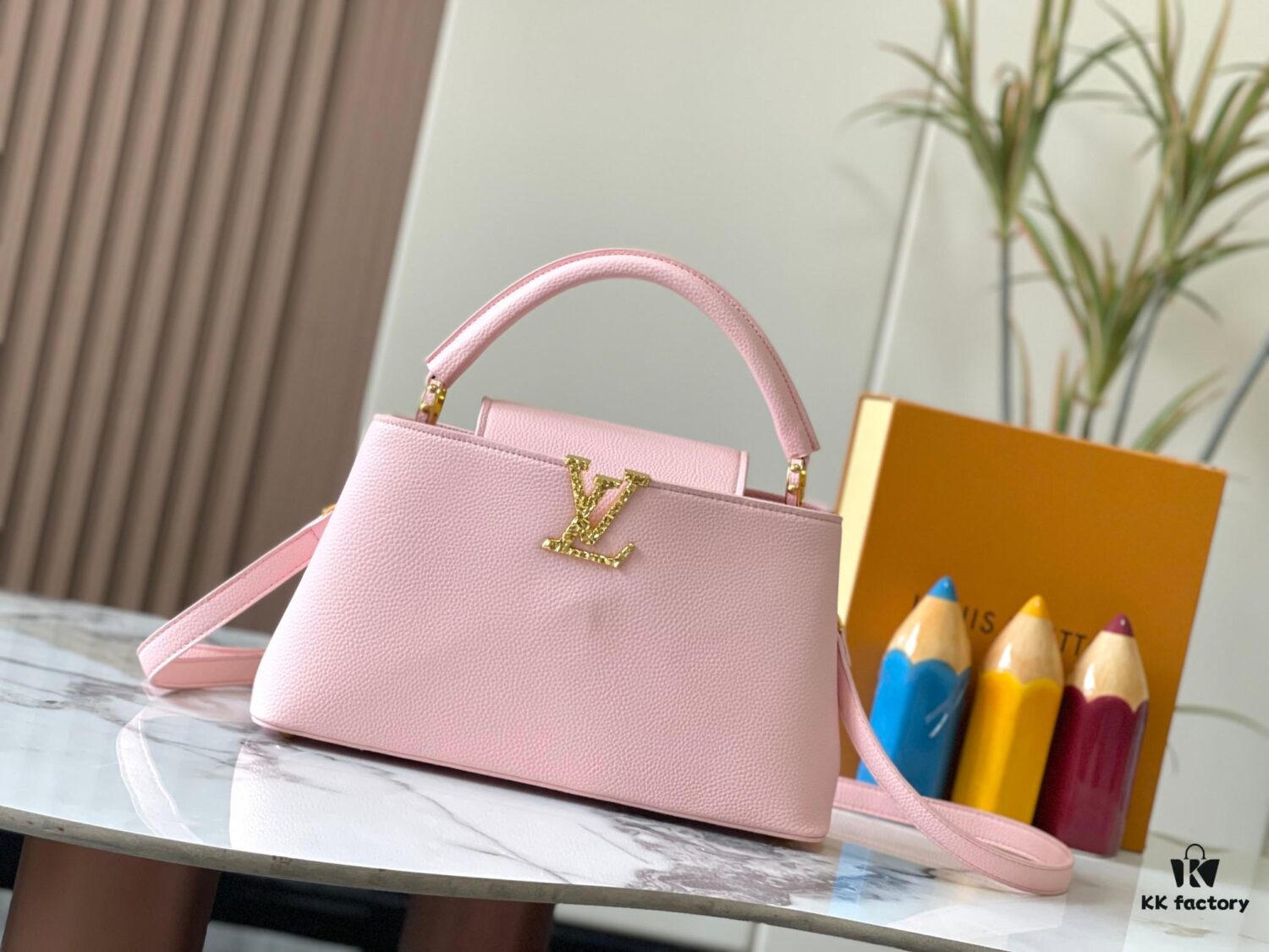 693082aa6e68136f4d9a7cca Upgraded M24664 Capucines East West Medium Handbag from the LV Crush Collection