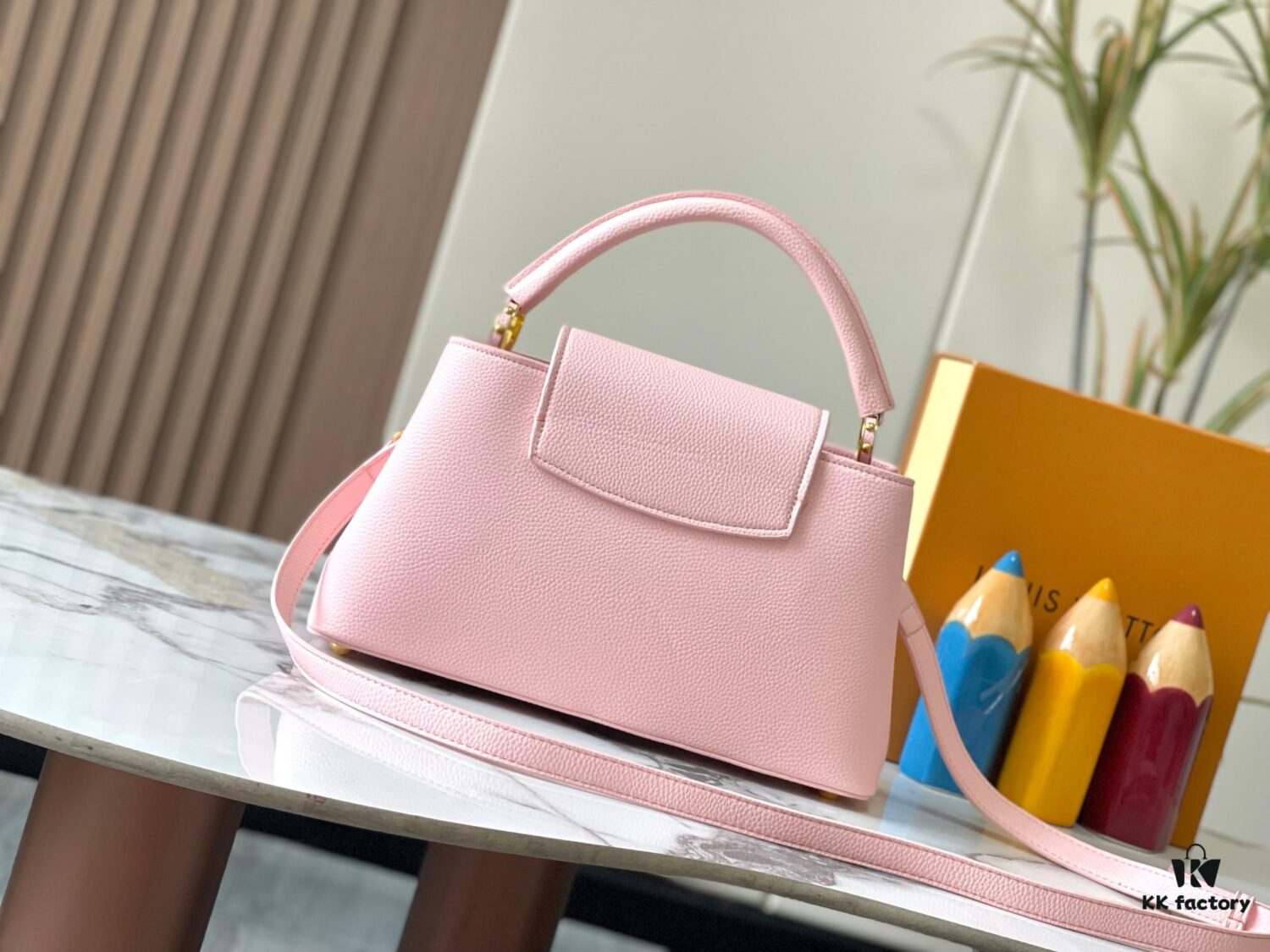 693082ab6e68136f4d9a7cce Upgraded M24664 Capucines East West Medium Handbag from the LV Crush Collection