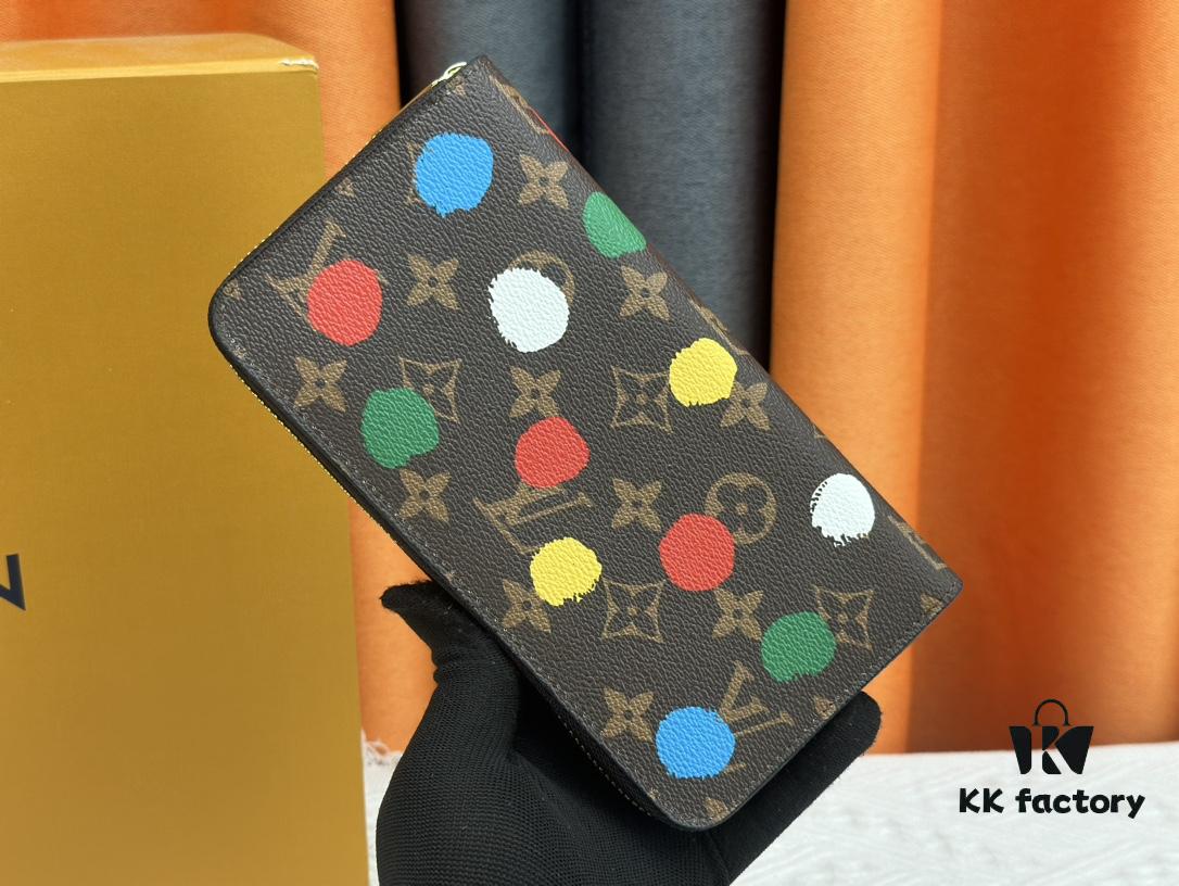 693082df6e68136f4d9a7d31 Wallet M60017 Red Dot (80828) Zippy Zipper Wallet - Printed Canvas Edition with Large LV Letters and Monogram Flowers
