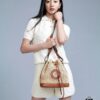 693083366e68136f4d9a7dcf New Large Batch LV NOE PURSE Bucket Handbag with Raffia and Leather Trim