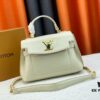 693083596e68136f4d9a7e0a Exclusive Background Upgraded Original Version M21088 M21052 M20997 This Season, the Petite Lockme Ever Mini Bag Features Fashionably Toned Grained Calfskin Leather