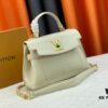 6930835a6e68136f4d9a7e0c Exclusive Background Upgraded Original Version M21088 M21052 M20997 This Season, the Petite Lockme Ever Mini Bag Features Fashionably Toned Grained Calfskin Leather