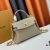 6930835e6e68136f4d9a7e12 Exclusive Background Upgraded Original Version M21088 M21052 M20997 This Season, the Petite Lockme Ever Mini Bag Features Fashionable New Hues in Grained Calfskin Leather