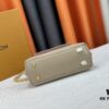 693083626e68136f4d9a7e18 Exclusive Background Upgraded Original Version M21088 M21052 M20997 This Season, the Petite Lockme Ever Mini Bag Features Fashionable New Hues in Grained Calfskin Leather
