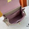 693083636e68136f4d9a7e1d Exclusive Background Upgraded Original Version M21088 M21052 M20997 This Season, the Petite Lockme Ever Mini Bag Features Fashionable New Hues in Grained Calfskin Leather