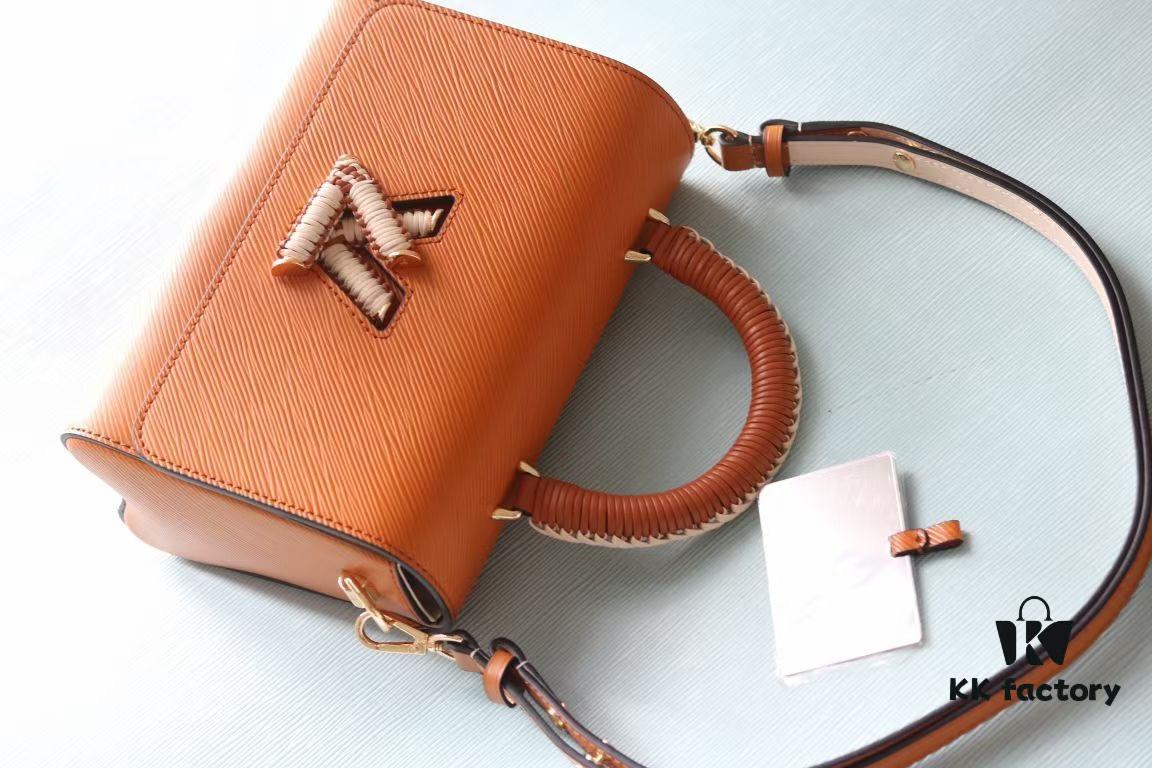 693083aa6e68136f4d9a7e9a Top Original Quality! Welcome to Compare Prices! Model No.: 50392/22229/22236. This LV Twist Medium Bag is crafted from Epi grained leather, featuring woven leather wrapping around the LV Twist lock and top handle, adding a soft elegance to its striking silhouette. The detachable and adjustable shoulder strap allows for versatile carrying options—short shoulder, long shoulder, or crossbody wear.