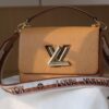 6930841c6e68136f4d9a7fb6 New Arrival Top Quality Twist Medium Handbag with Detachable Jacquard Strap and Leather Handle