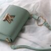 6930844e6e68136f4d9a802a New Arrival Top Quality Original Version Twist Medium Handbag - Model No. 50398/23390/23389