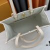 693085226e68136f4d9a81f8 OnTheGo MM Bag from Sunrise Aquarelle Collection
