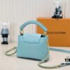 6930861e6e68136f4d9a8453 Upgraded M59850 Stellar Pearlized Blue Shell Button Capucines Mini Bag