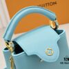 693086216e68136f4d9a8457 Upgraded M59850 Stellar Pearlized Blue Shell Button Capucines Mini Bag