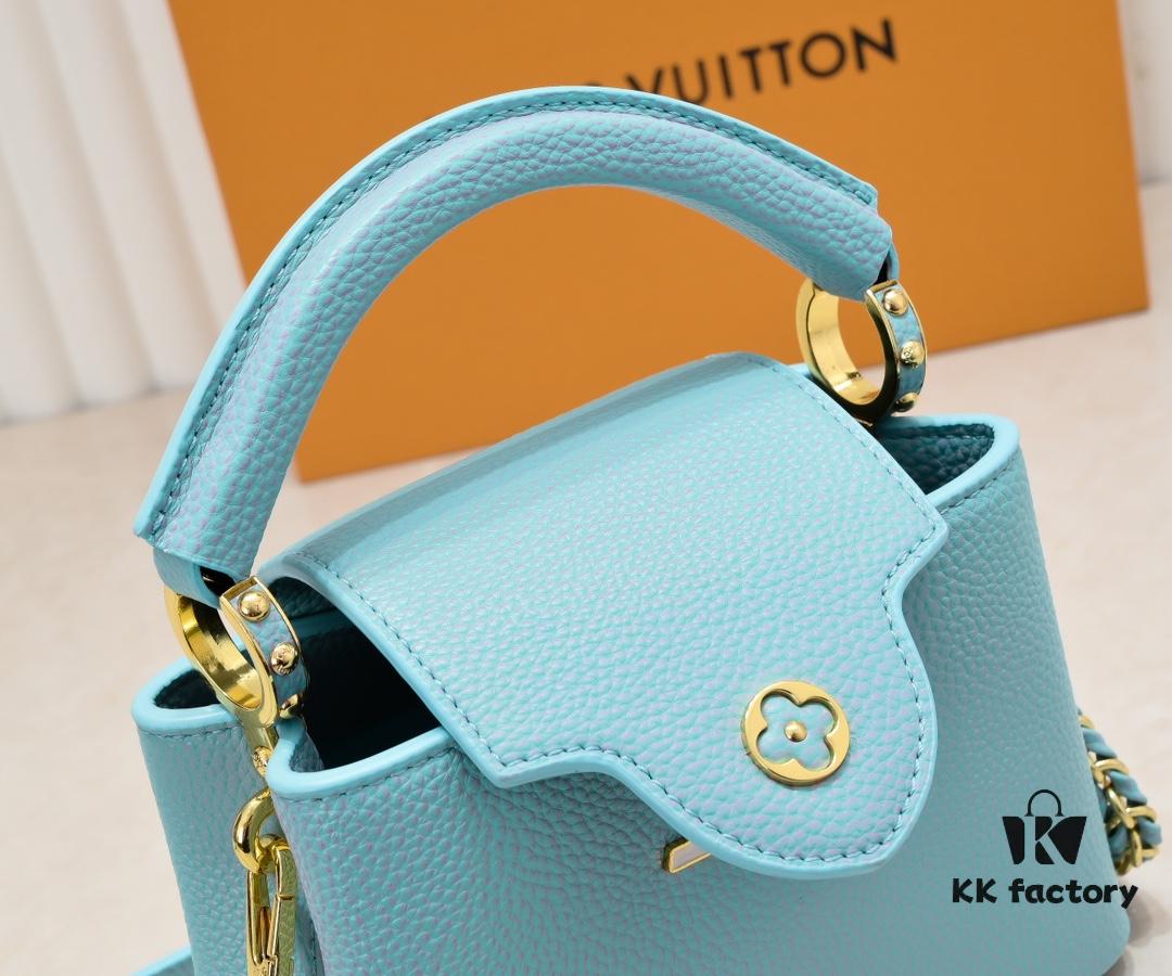 693086216e68136f4d9a8457 Upgraded M59850 Stellar Pearlized Blue Shell Button Capucines Mini Bag