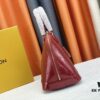 693086fc6e68136f4d9a865a Authentic Exclusive Real-Photo Background! M54395, M54785, 54786 This avant-garde and modern Tote Miroir Clutch made from smooth patent calf leather. Large LV letter print, bold silhouette lines, unique design pairing, comes with a detachable new-style shoulder strap!