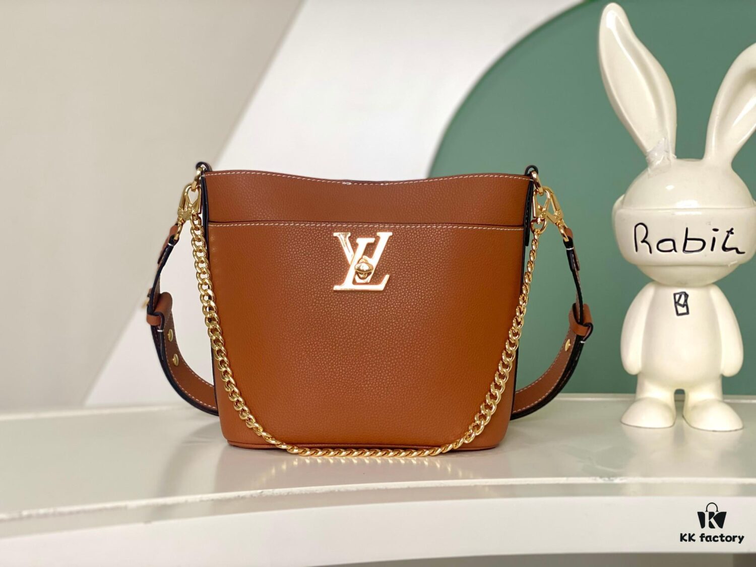 693088316e68136f4d9a88b7 Haiyuan Export Genuine Leather Bucket Bag Chain Bag Series Lock and Walk Handbag M24006 Black M24638 White M24165 Brown